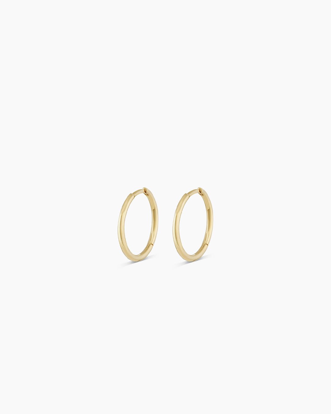 Woman wearing Classic Gold Huggie || option::14k Solid Gold, 11mm