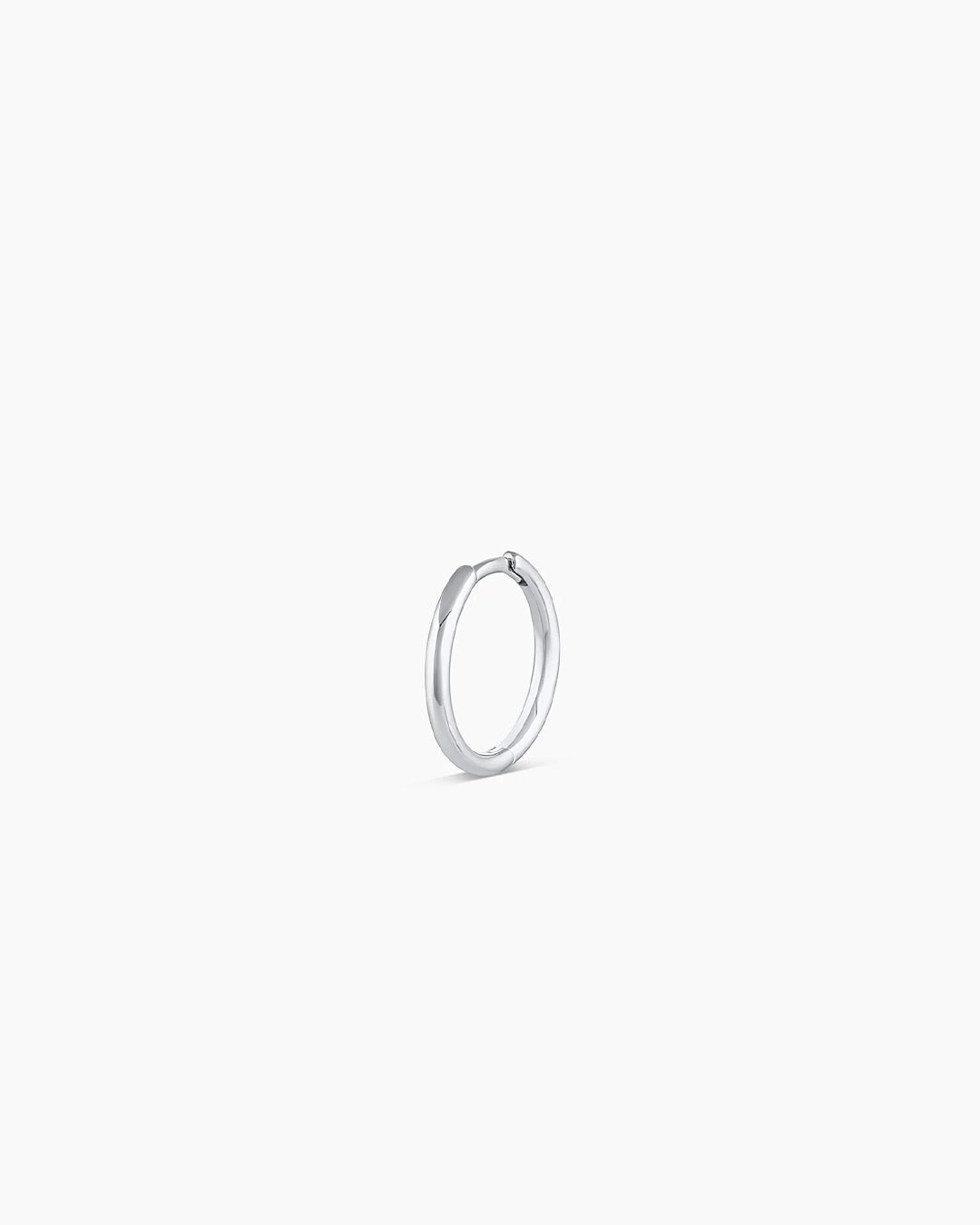 Woman wearing Classic Gold Huggie || option::14k Solid White Gold, 11mm, Single