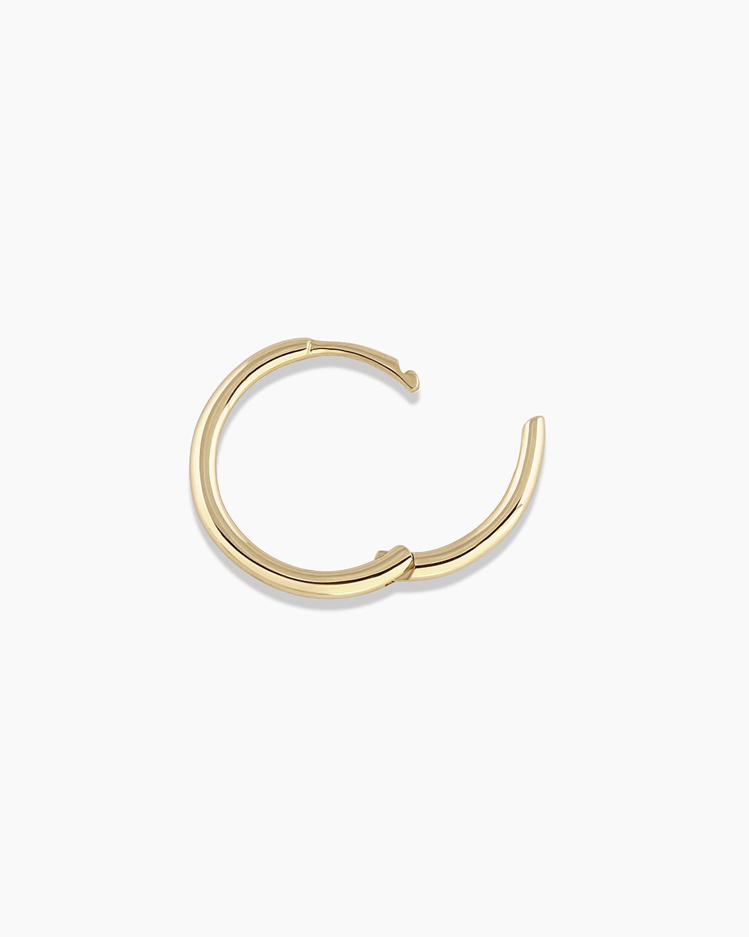 Woman wearing Classic Gold Huggie || option::14k Solid Gold, 13mm